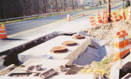 Photo of a vault in New York State. Maintenance requires lane closure. (Photo by NYSDOT.)
