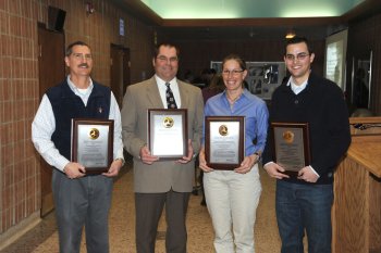Pictured from left to right award recipients Bill Rudd WGFD, John Eddins WYDOT, Anna Chalfoun Wyoming Cooperative Fish and Wildlife Research Unit, and Chad LeBeau West Inc.
