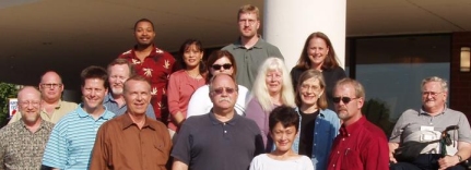 Caption: Photo of the FHWA Resource Center Environment Technical Service Team. From left to right: Back row - Brian Smith, Katiann Wong Murillo, Brian Yanchik, K. Lynn Berry. Middle row - Kevin Moody, Dave Gamble, Deborah Scherkoske, Stephanie Stoermer, Kimberly Majerus, David Sullivan. Front row - Rodney Vaughn, David Grachen, Don Cote, William Van Peeters, Mary Ann Rondinella, and Bob Carl. 