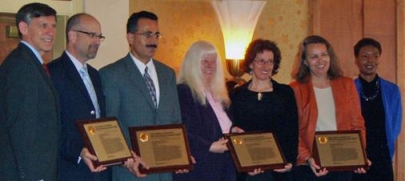 Caption: Photo of the recipients of the National Environmental Streamlining Excellence Award receive recognition. From left to right : Rick Capka; Mike Davis-Carter Burgess; Maiser Khaled-FHWA California Division; Stephanie Stoermer-FHWA Resource Center; Nancy Levin- EPA Region 9; Cindy Adams-Caltrans; Gloria Shepherd. Photo taken by Don Cote.
