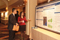 Eisenhower Fellow Erin Bailey conversing with visitor at Poster Session I