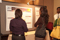 Eisenhower Fellow Kristen Lewis conversing with U&GP Marketing Analyst Stephanie Carter at Poster Session I