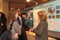 Eisenhower Fellow Amanda Gunnell with visitors at Poster Session I