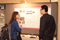 Eisenhower Fellow Shiyun Wang conversing with visitor at Poster Session I