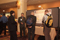 Eisenhower Fellow Daniel Estrada conversing with visitors at Poster Session I