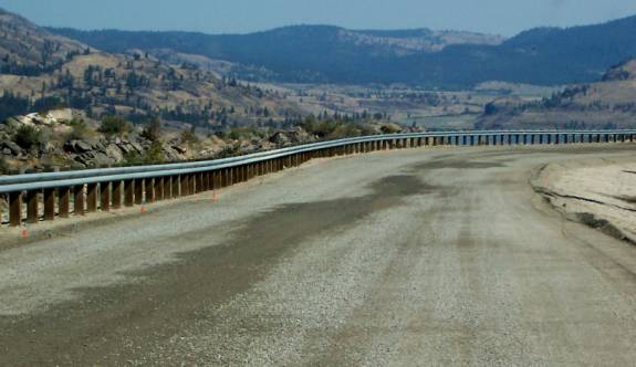 photo of a roade with a guardrail