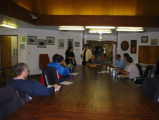 photo of eight people at a conference table