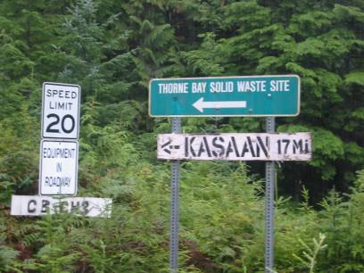 photo of road signs: speed limit 20, equipment in roadway, Thorne Bay Solid Waste Site, Kasaan 17 mi
