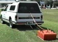 There are two pictures on this page and both show the use of vehicle-operated ground penetrating radar units.